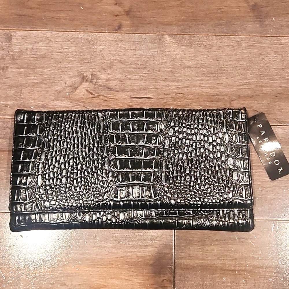 Paradox clutch purse